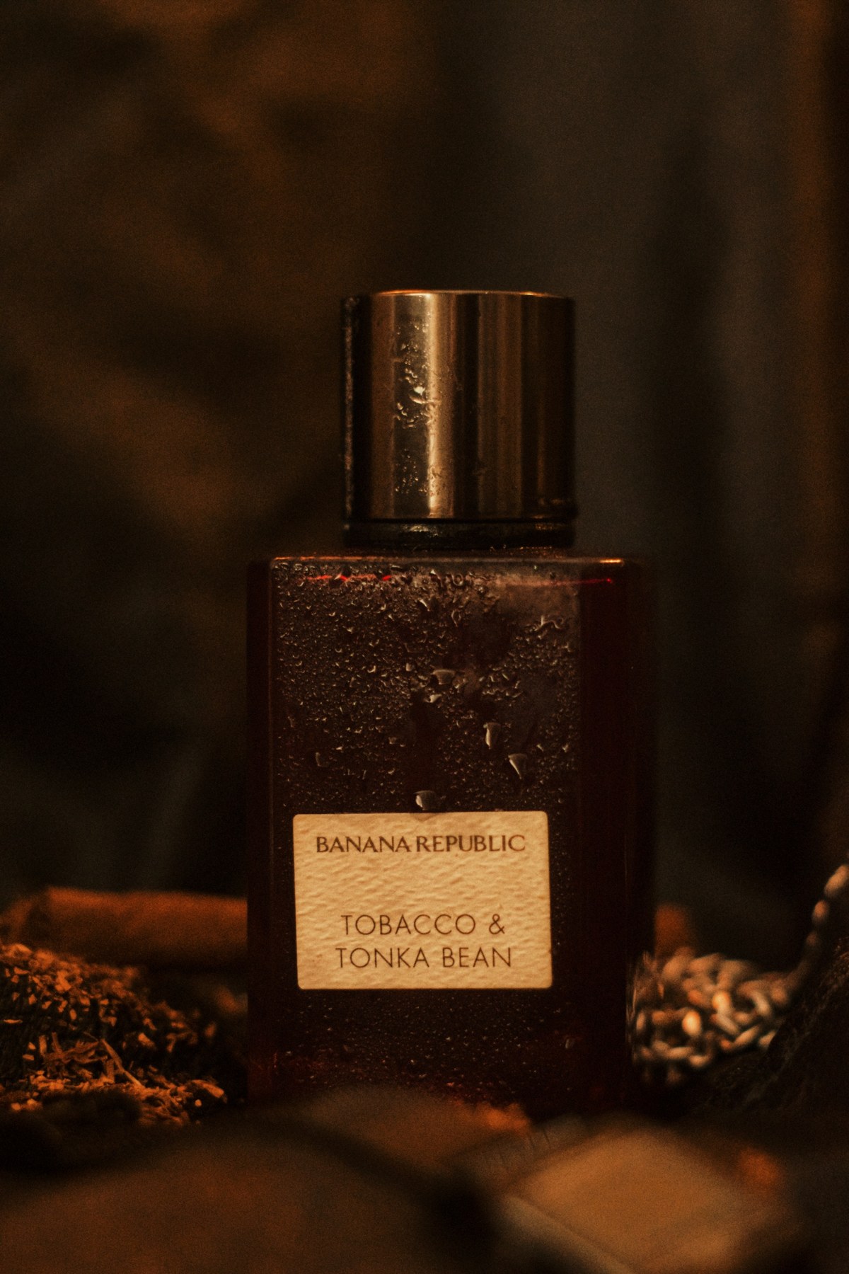 Banana Republic Tobacco & Tonka Bean fragrance styled with loose tobacco and cinnamon
